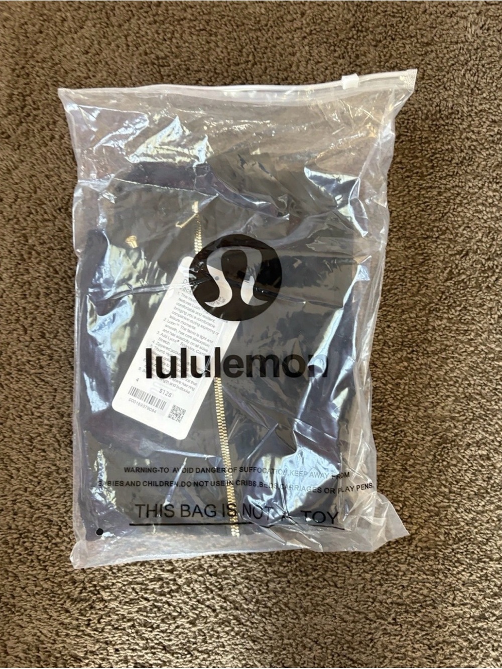 lululemon athletica Black Jacket with leggings, and Gold Zipper. text 5045474637